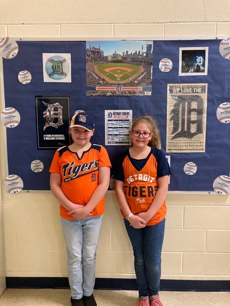 Two young students wearing Detroit Tigers spirit wear
