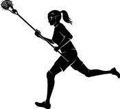 Girl running with lacrosse stick