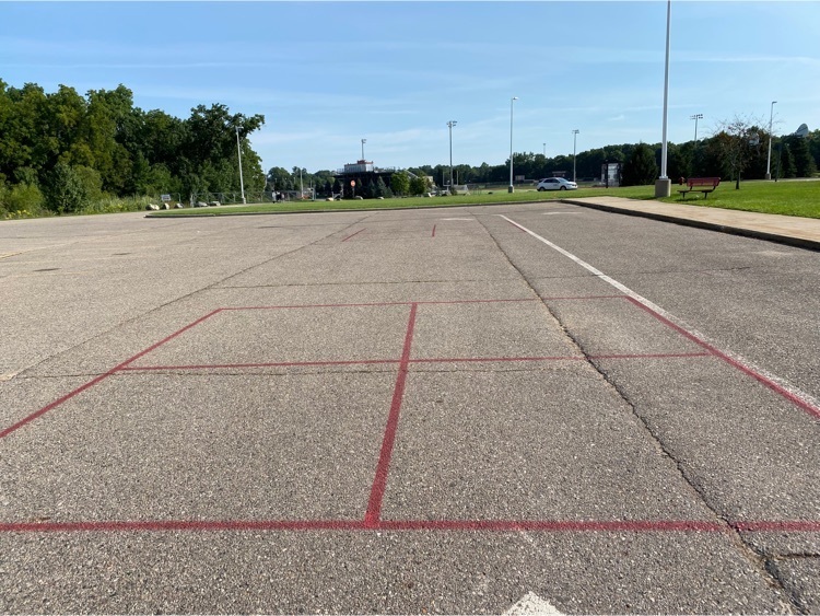blacktop with red paint in four squares together 