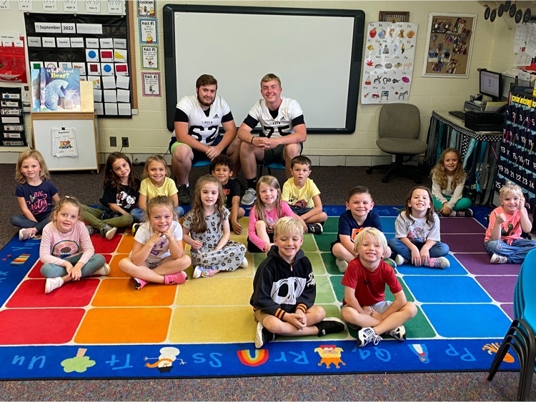 LHS football players read to Hyatt Kindergarten! 