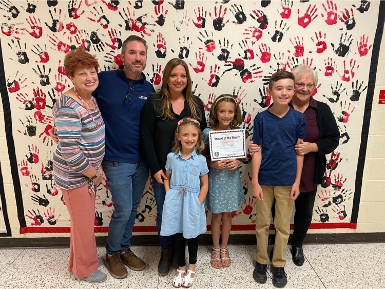 Family picture for student of the month recognition .