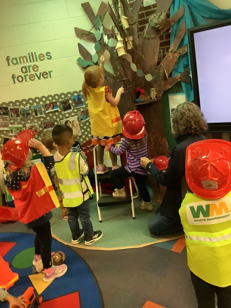 Preschool rescuing a cat from the tree. 