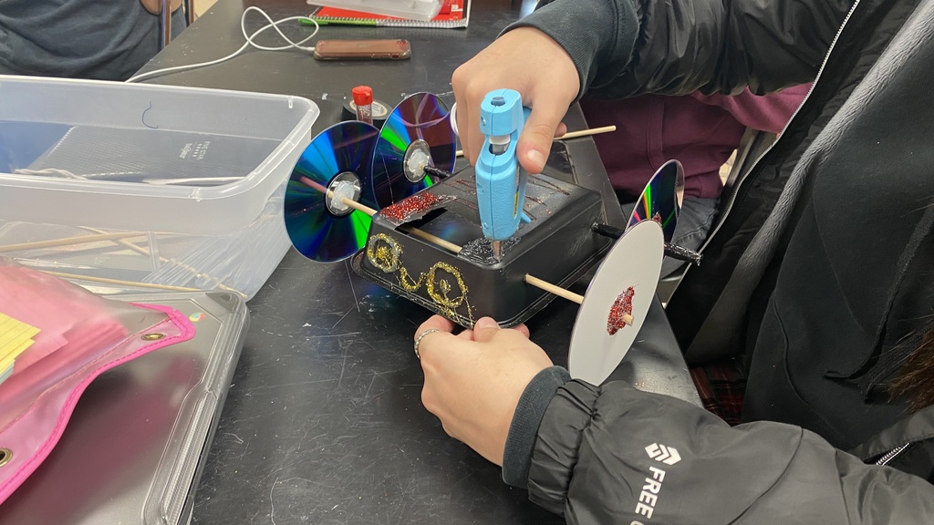 Student making mousetrap car
