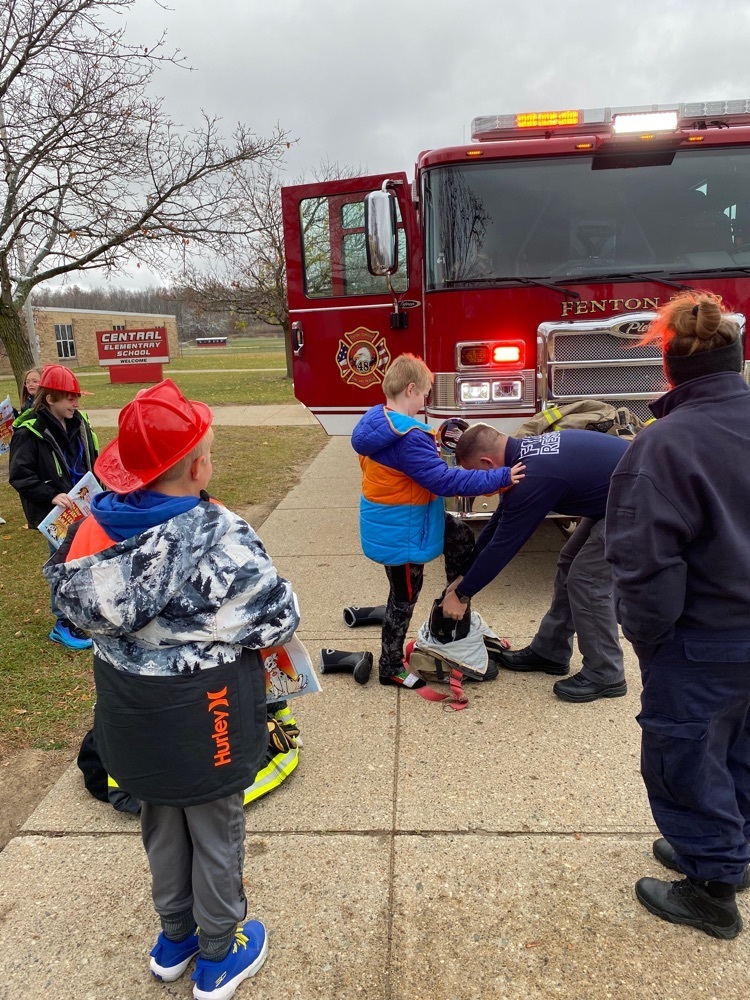 Trying on actual fire equipment