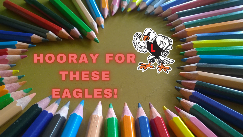 colored pencils arranged to make the shape of a heart with the words Hooray for these eagles!