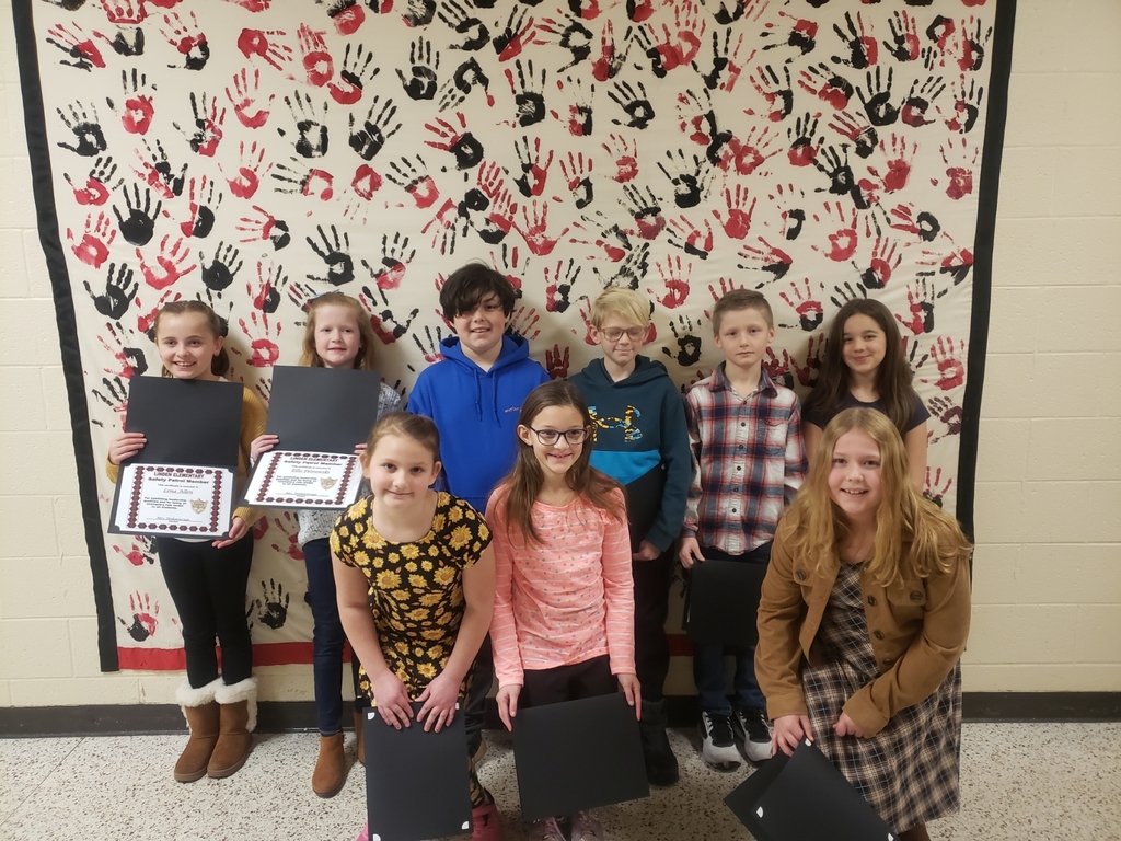 Linden El Safety Patrol holding certificates.