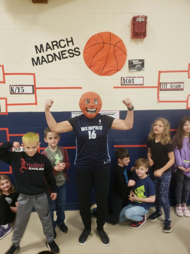 teacher with basketball mask on.